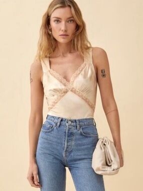 Reformation Cream Sleeveless
Top with Cut Out